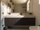 INTERIOS. Dein Interior-Design-Studio. Modernes Badezimmer mit Waschtisch, schwarzem Unterschrank und großem Spiegel