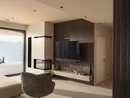 INTERIOS. Dein Interior-Design-Studio. Modernes Wohnzimmer mit Kamin, Fernseher und Blick auf einen See und Berge